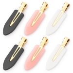 Set of six D creaseless hair clips in black, pink, and white with golden handles, arranged on a surface.