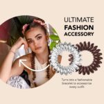 An 8-pack of invisibobble Original spiral hair ties, four in crystal clear and four in pretzel brown, displayed.