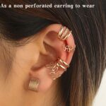 Close-up of 20 gold metal alloy hair braid clips and non-piercing ear clips in various decorative styles.