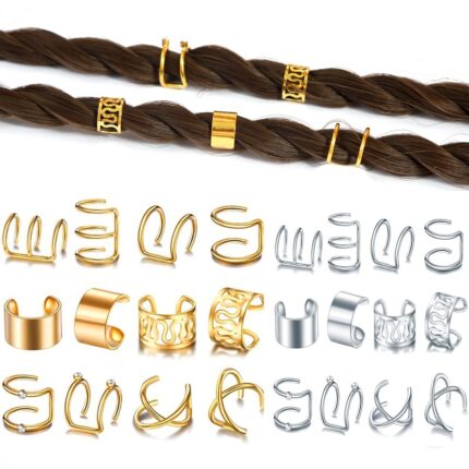 A close-up view of various gold and silver hair braid and dreadlock cuffs, showcasing different unique designs.