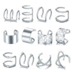 A close-up view of various gold and silver hair braid and dreadlock cuffs, showcasing different unique designs.